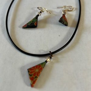 Origami red and black floral charm on black cord with matching earrings